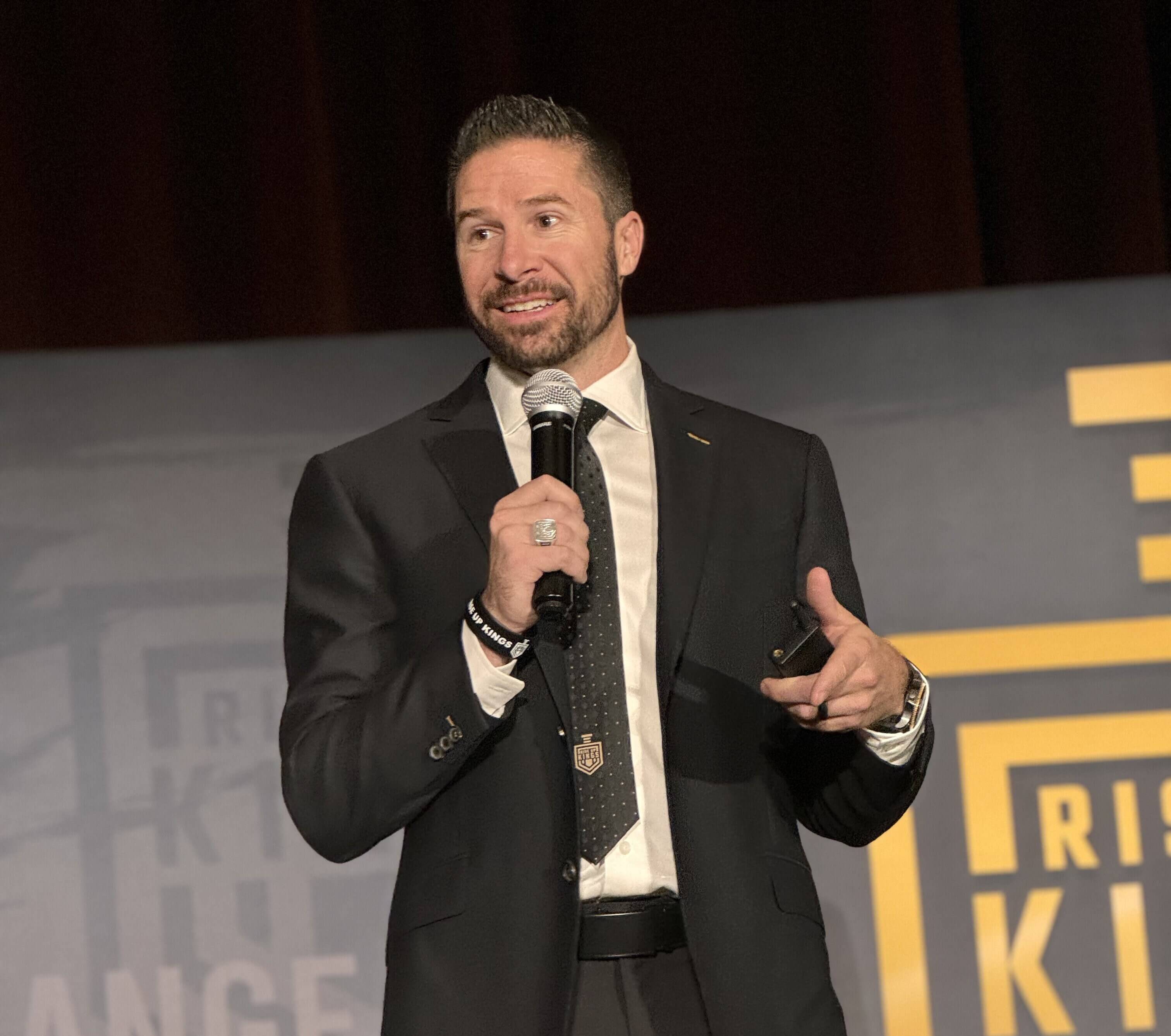 Skylar Lewis speaking on stage