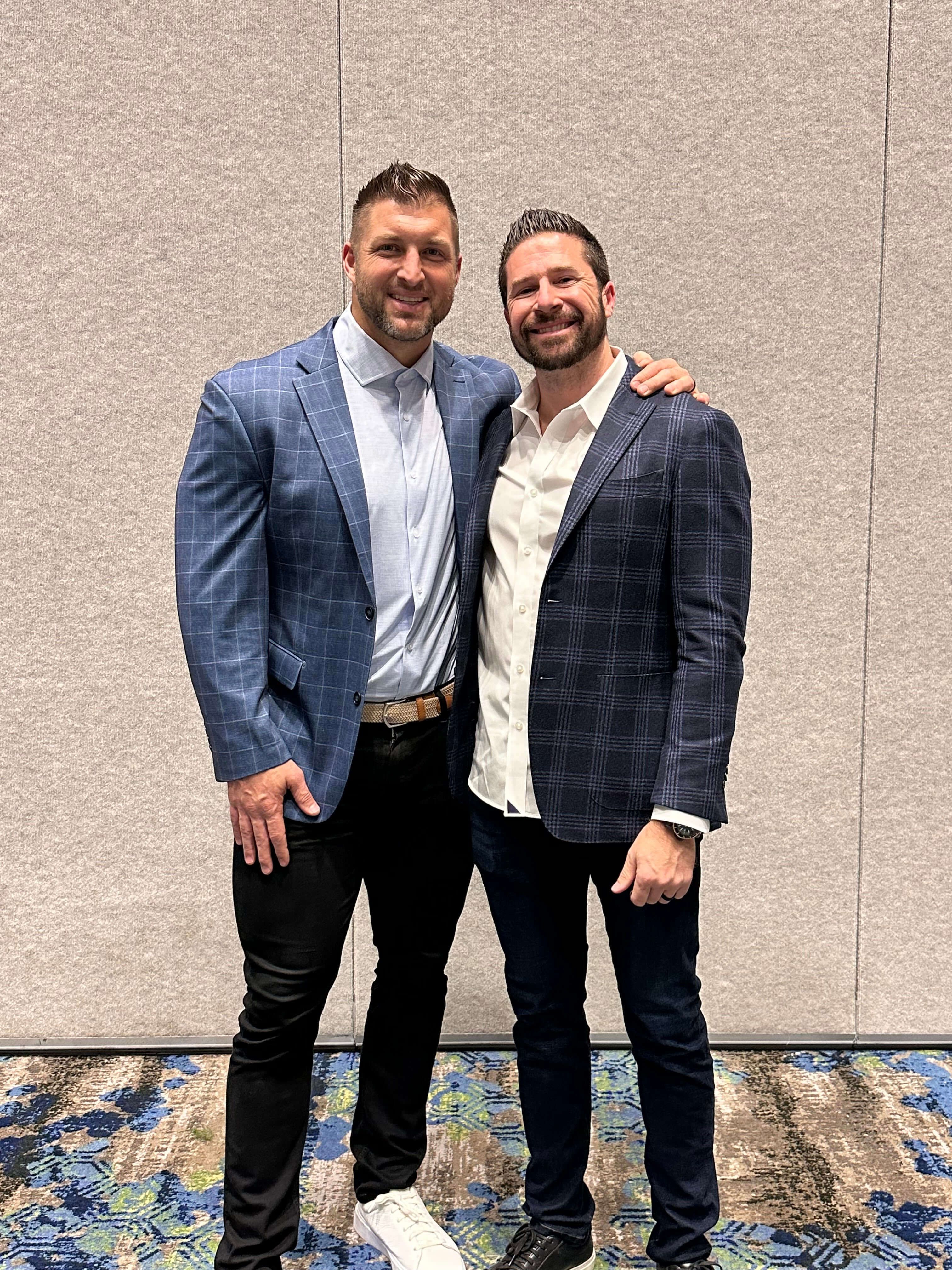 Skylar Lewis with Tim Tebow